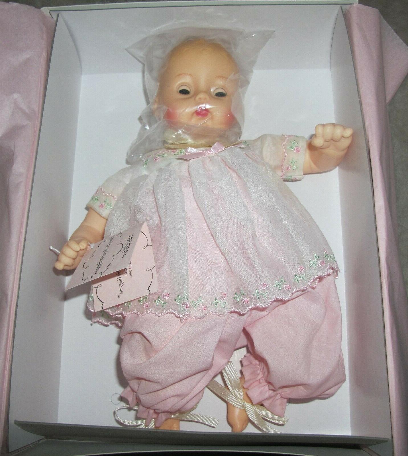 doll in pink dress