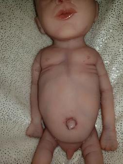 Preemie Silicone Baby boy open eyes